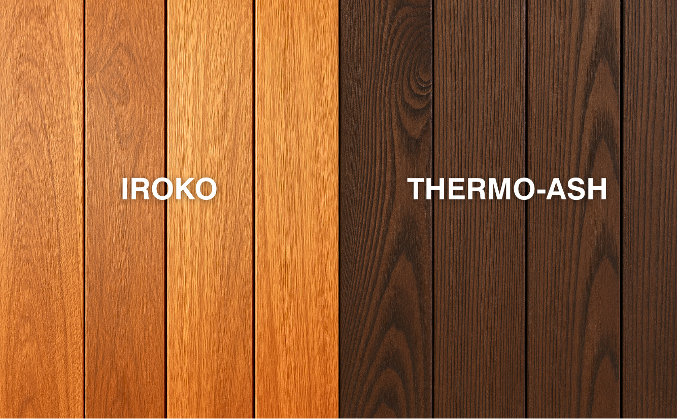 Side-by-side comparison of Iroko decking and Thermo-Ash decking boards showing colour and grain differences – Iroko with warm golden-brown tones and Thermo-Ash with rich dark brown hues.