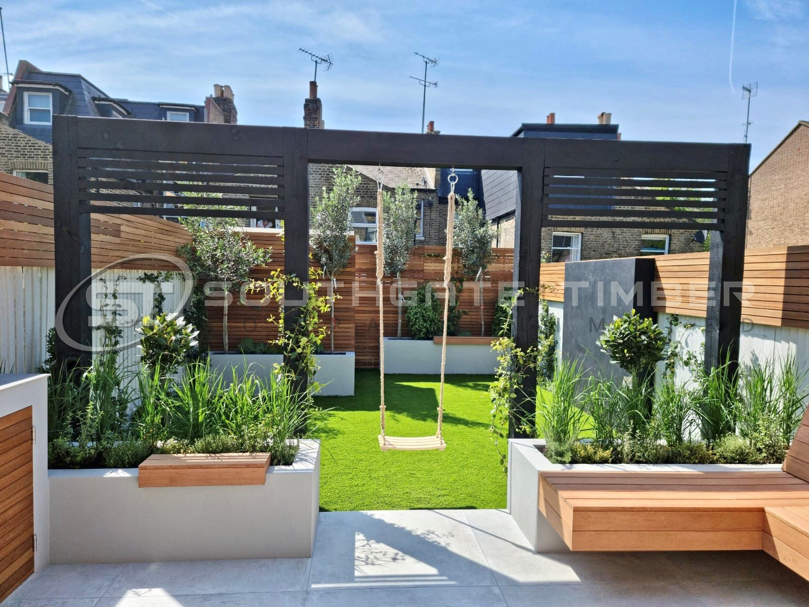 Yellow Balau fencing, 10 x 45mm PAR battens. Bespoke garden design inspiration, timber design. Timber fencing design, durable, stable, versatile and cost-effective bespoke fencing materials