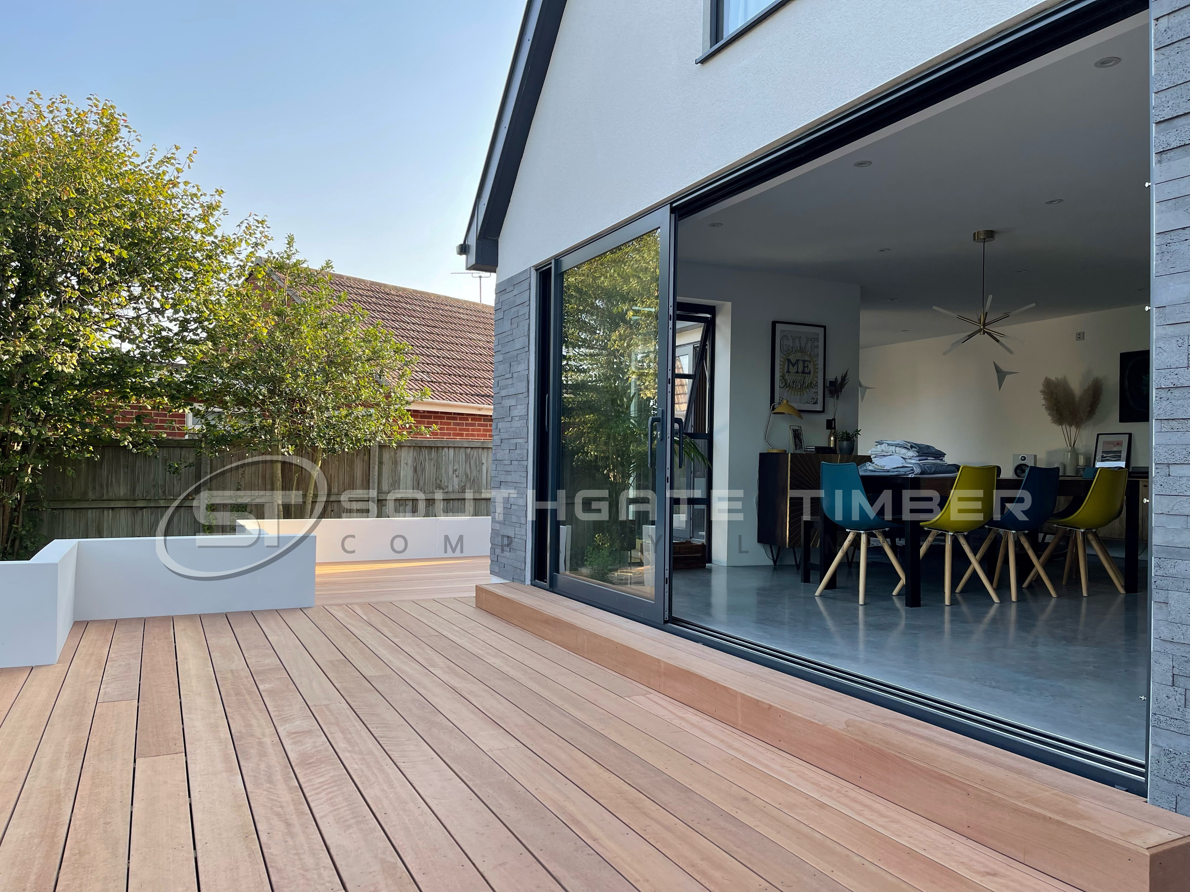 Yellow Balau hardwood decking smooth both sides 21 x 145mm. Top 5 decking choices in UK 2025. Finished garden decking project garden goals of decking kitchen terrace