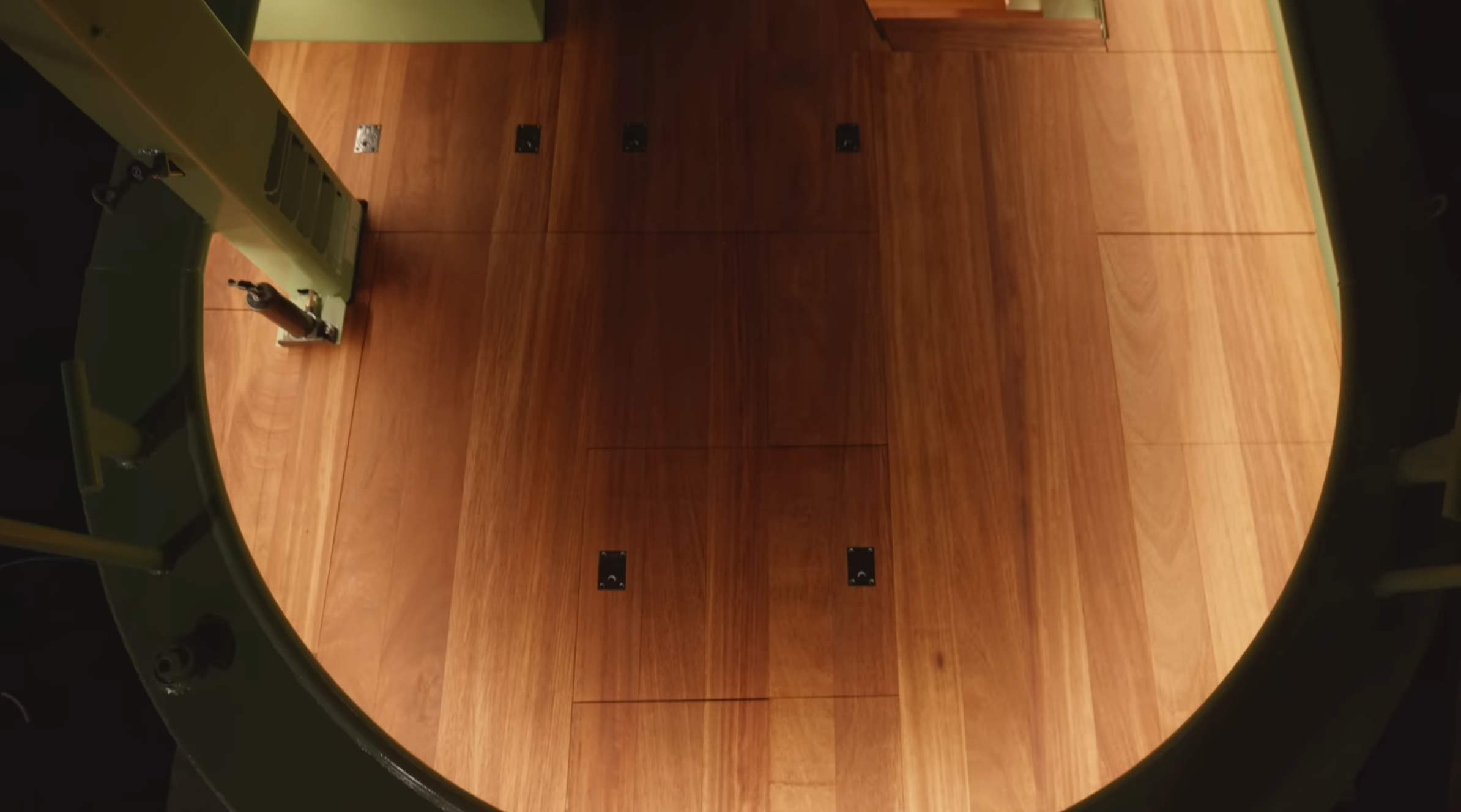 Close-up of bespoke machined Iroko tongue and groove decking supplied by Southgate Timber, installed on the narrowboat raffle project in collaboration with The Home Improvements Channel.