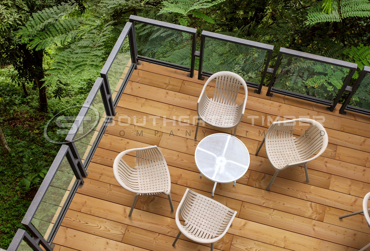 Thermory spruce decking installed on a contemporary balcony, showing the clean natural finish of this thermally modified decking due early 2026
