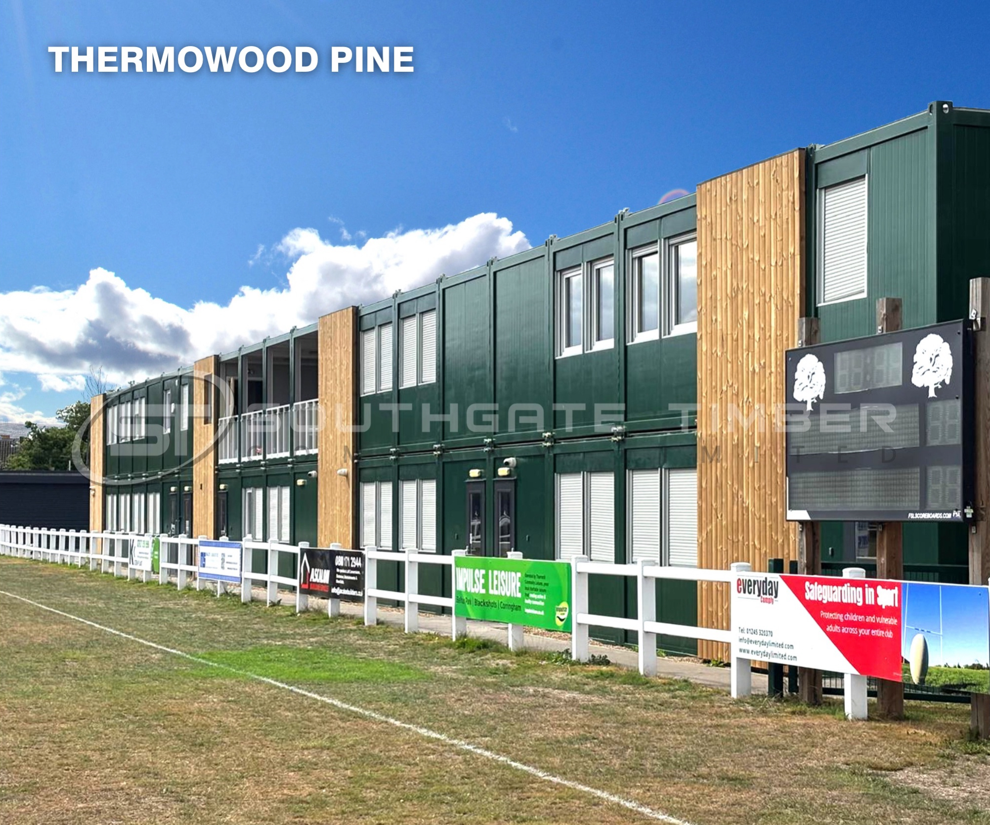 Thermowood pine cladding on a modern modular building, featuring vertical timber boards with a warm golden colour and contemporary architectural finish.