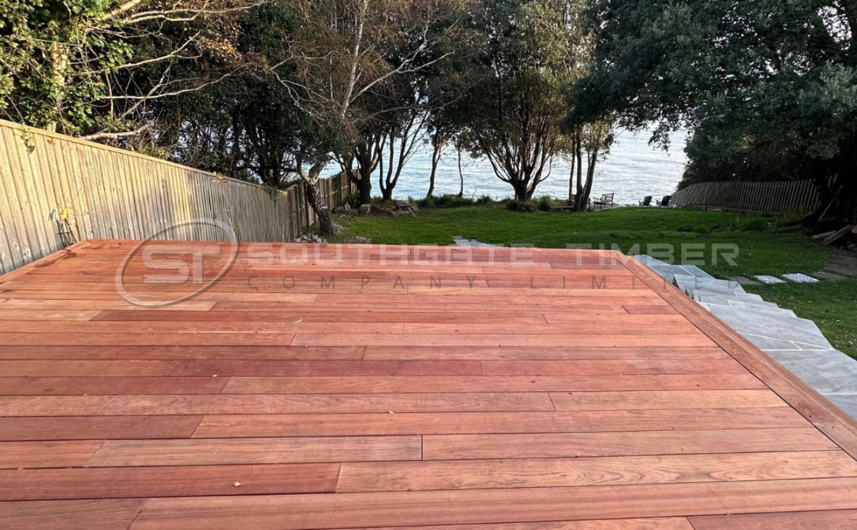 Jatoba hardwood decking boards installed in a UK garden overlooking the water