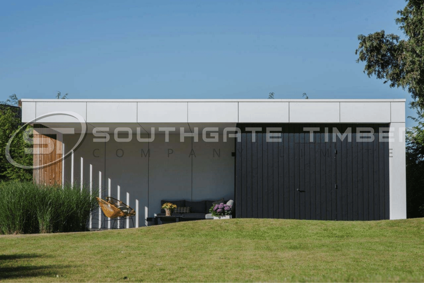 Modern exterior clad with black Thermo Spruce timber cladding