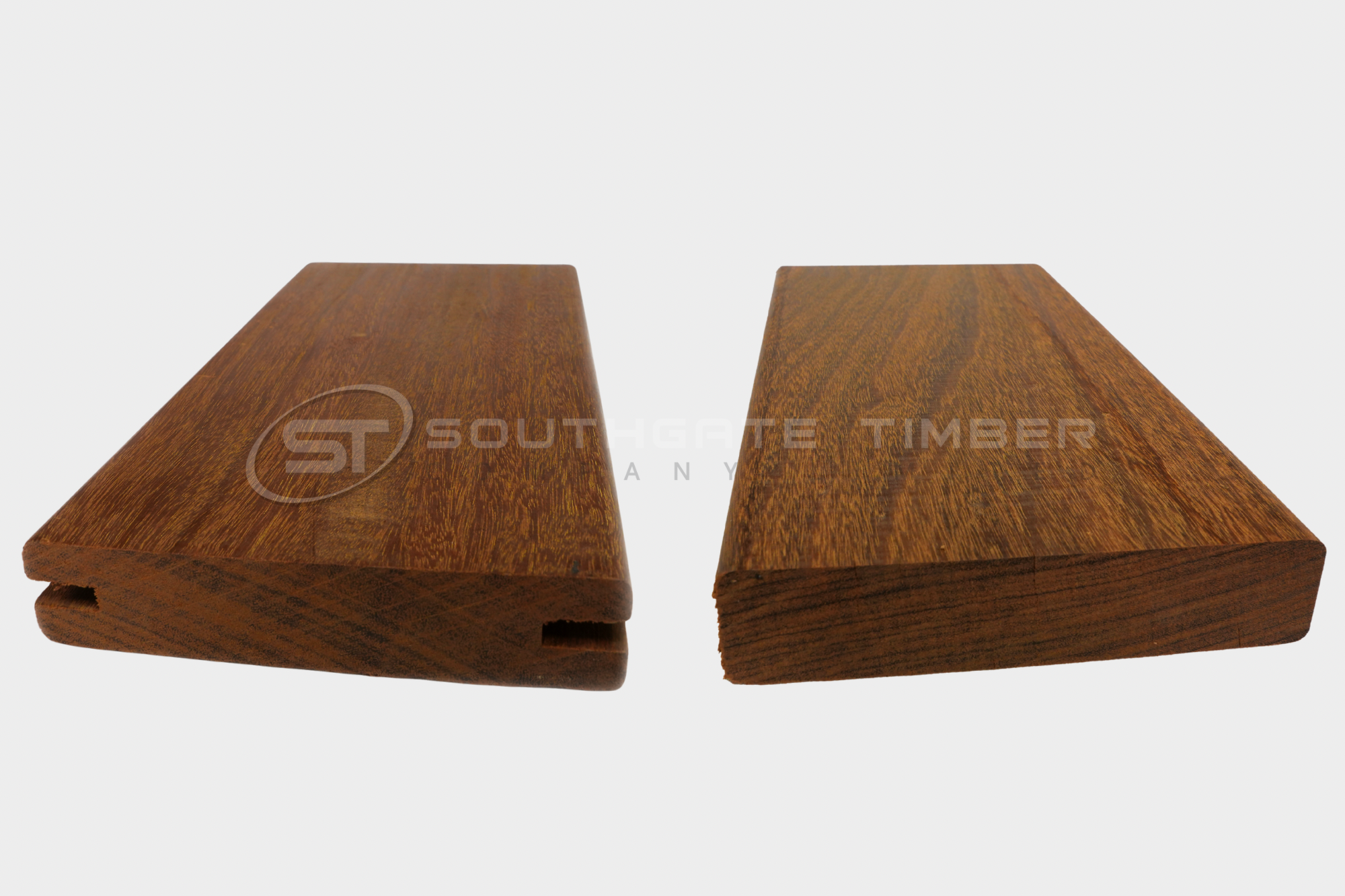 Ipe decking boards showing hidden fix grooved profile and standard face fix smooth profile comparison