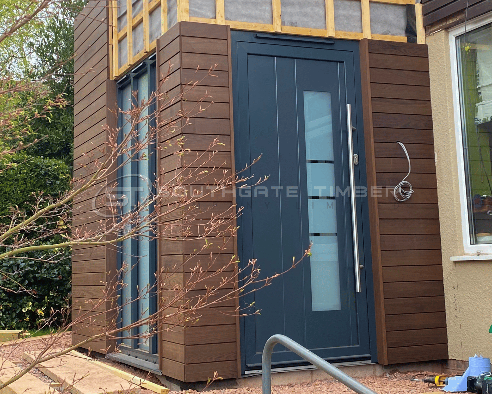 Thermo Ash timber cladding with rich warm tones installed on modern exterior extension project