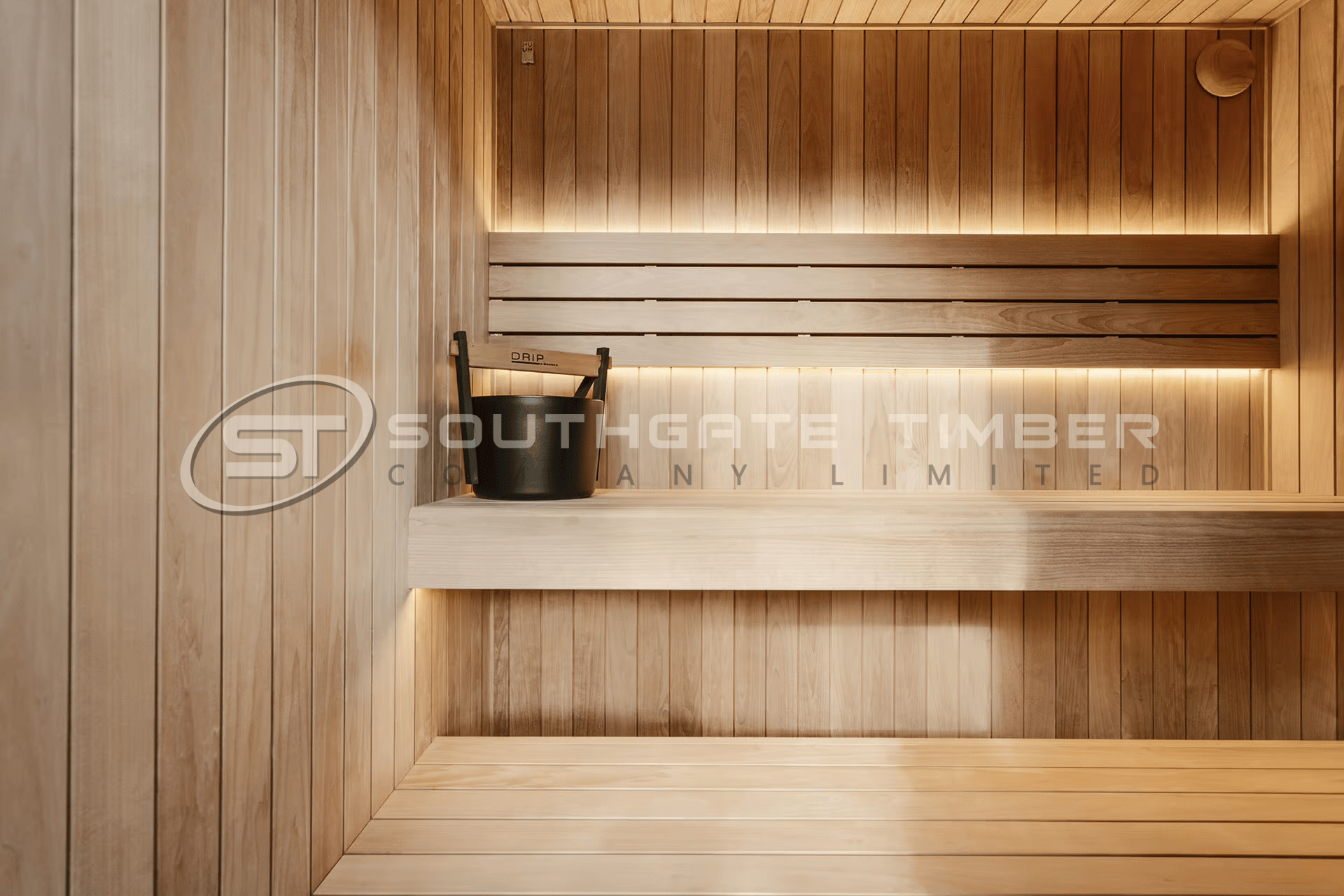     Thermo Aspen STS4 wall cladding and timber benches in a modern sauna
