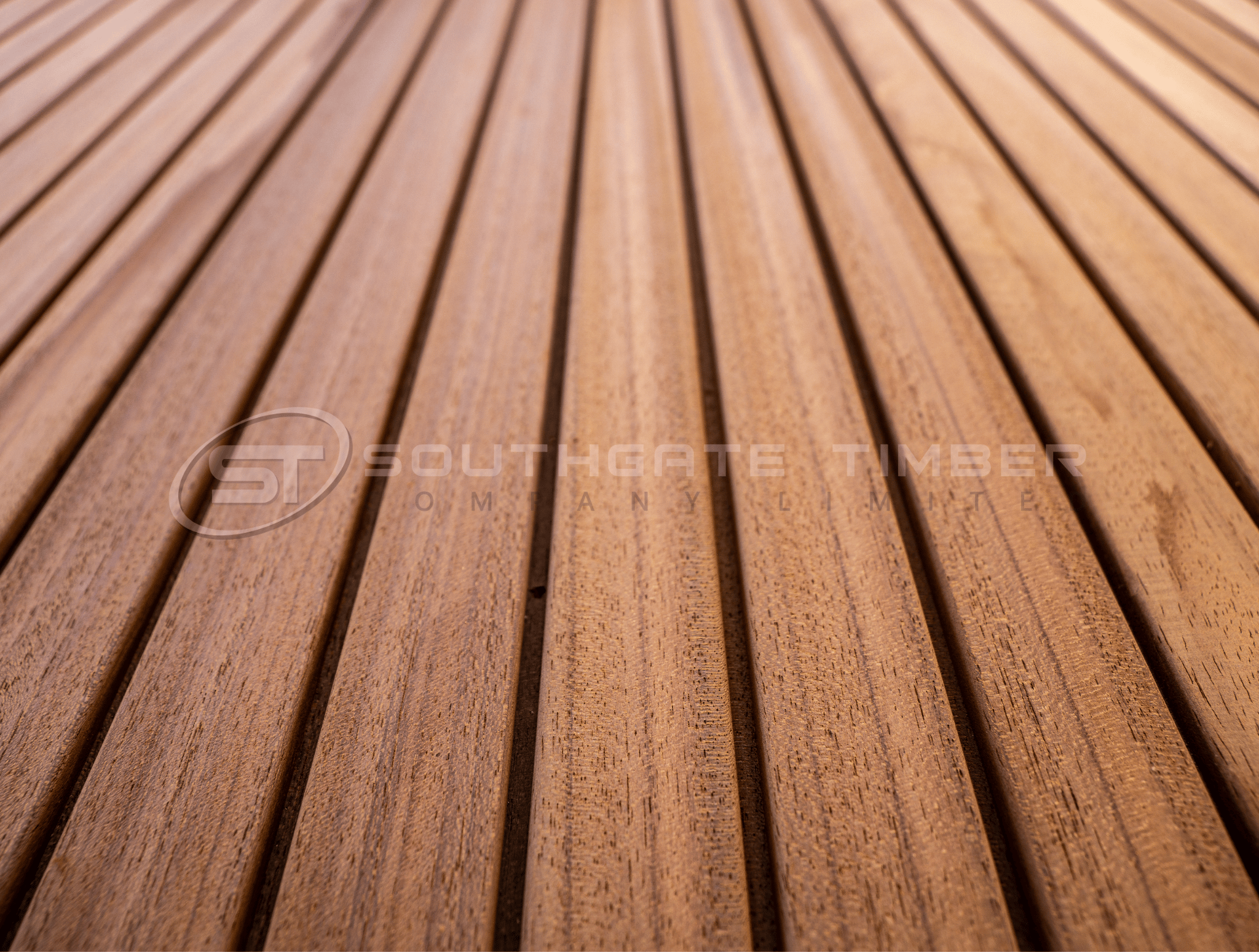 Close-up of Thermo Ayous 3-Stripe cladding profile showing textured grooved boards