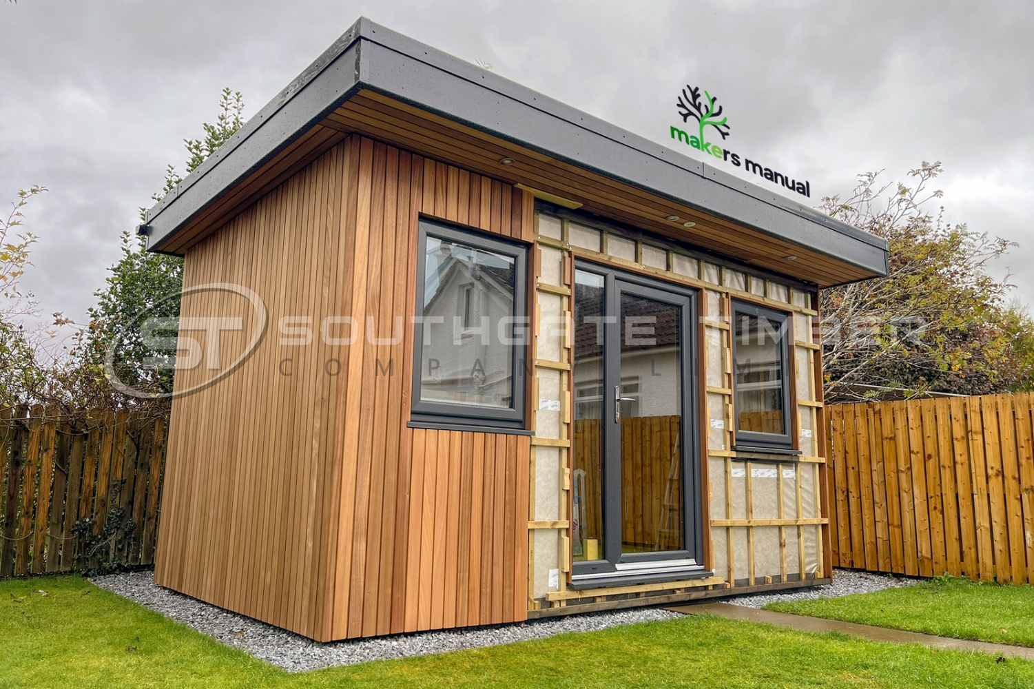 Garden room cladding installation with Thermo Ayous showing battens, insulation and vertical profile
