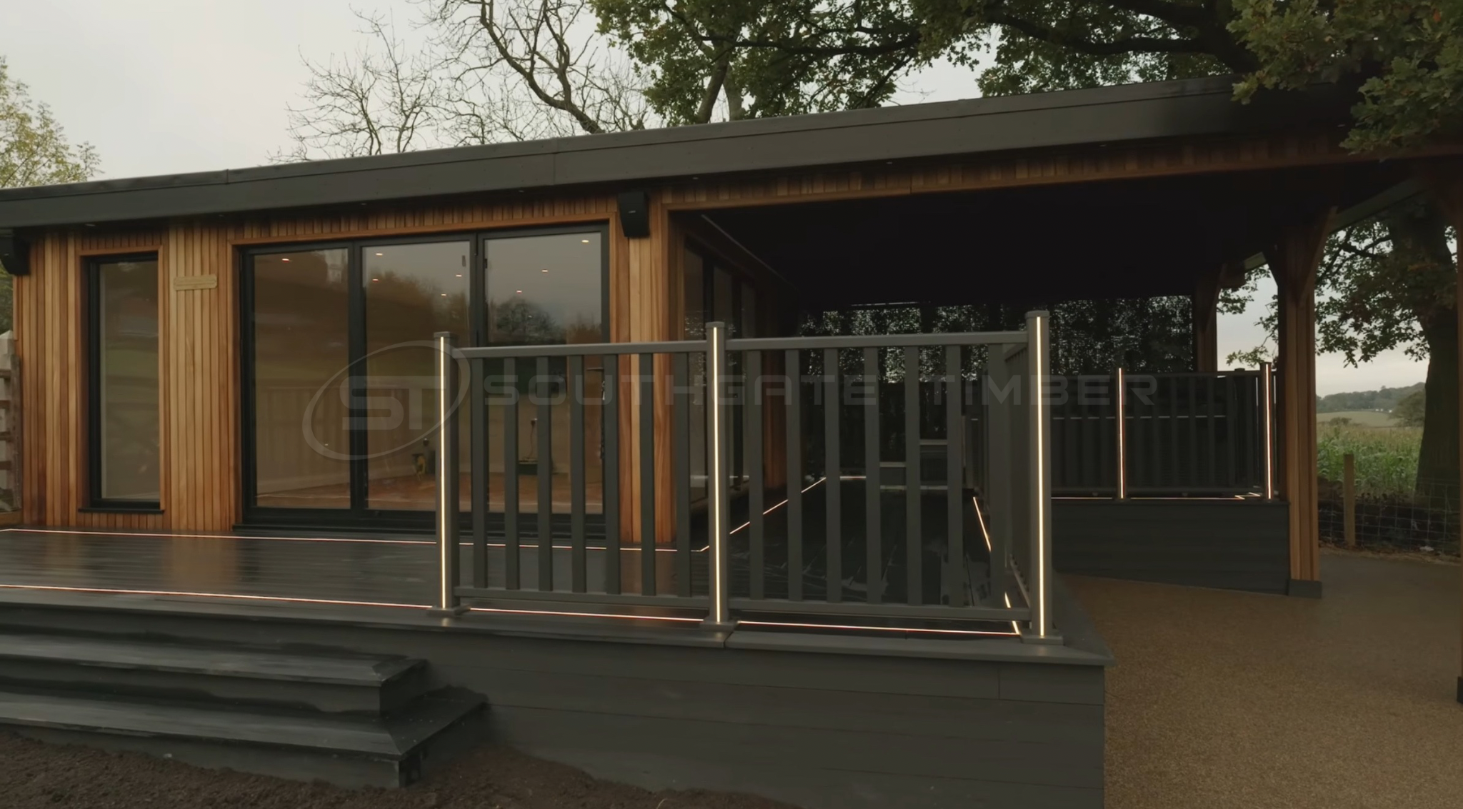 Modern Thermo Ayous timber cladding on contemporary garden room with low maintenance thermally modified timber finish