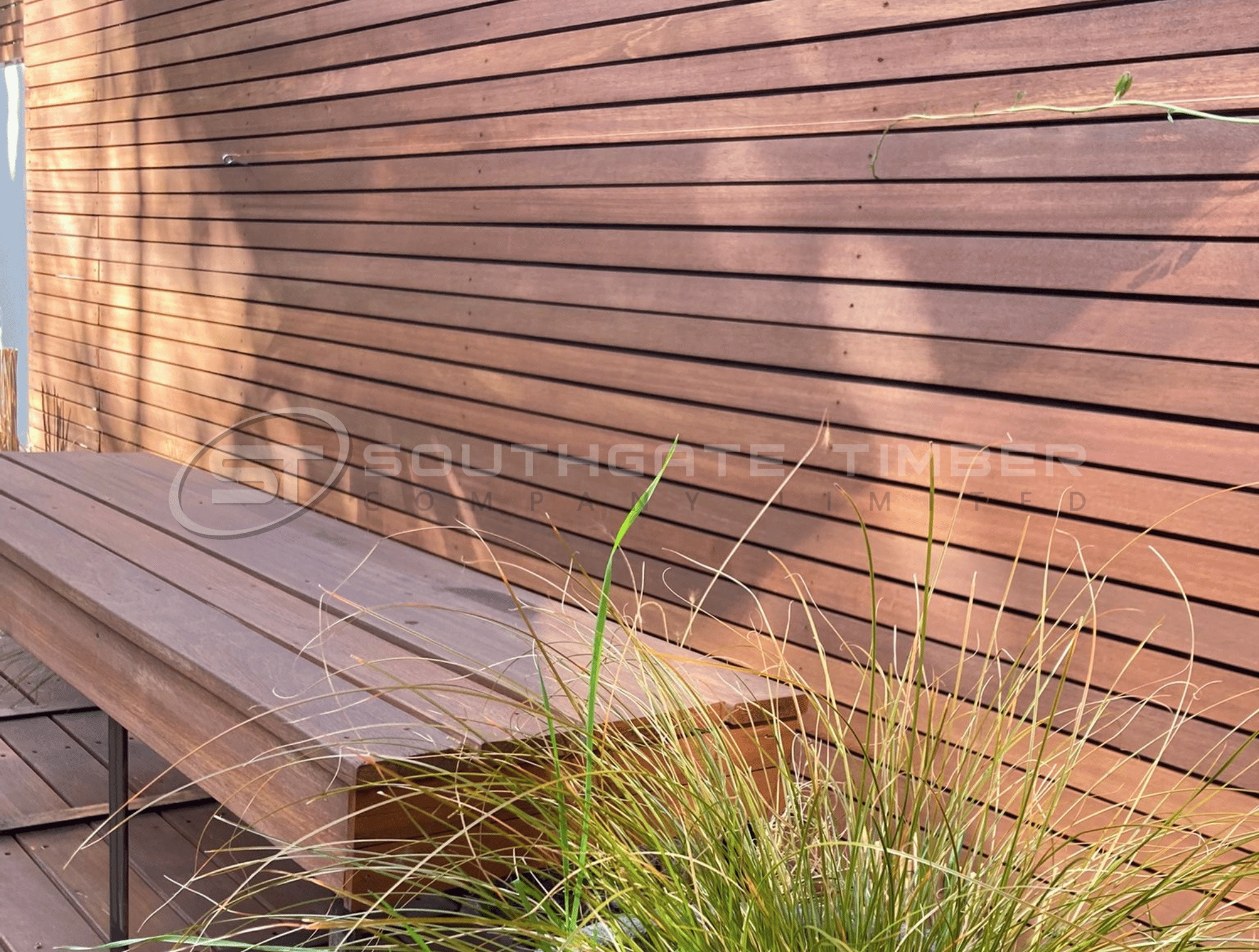 Close-up of thermally modified decking and cladding grain showing rich brown tone
