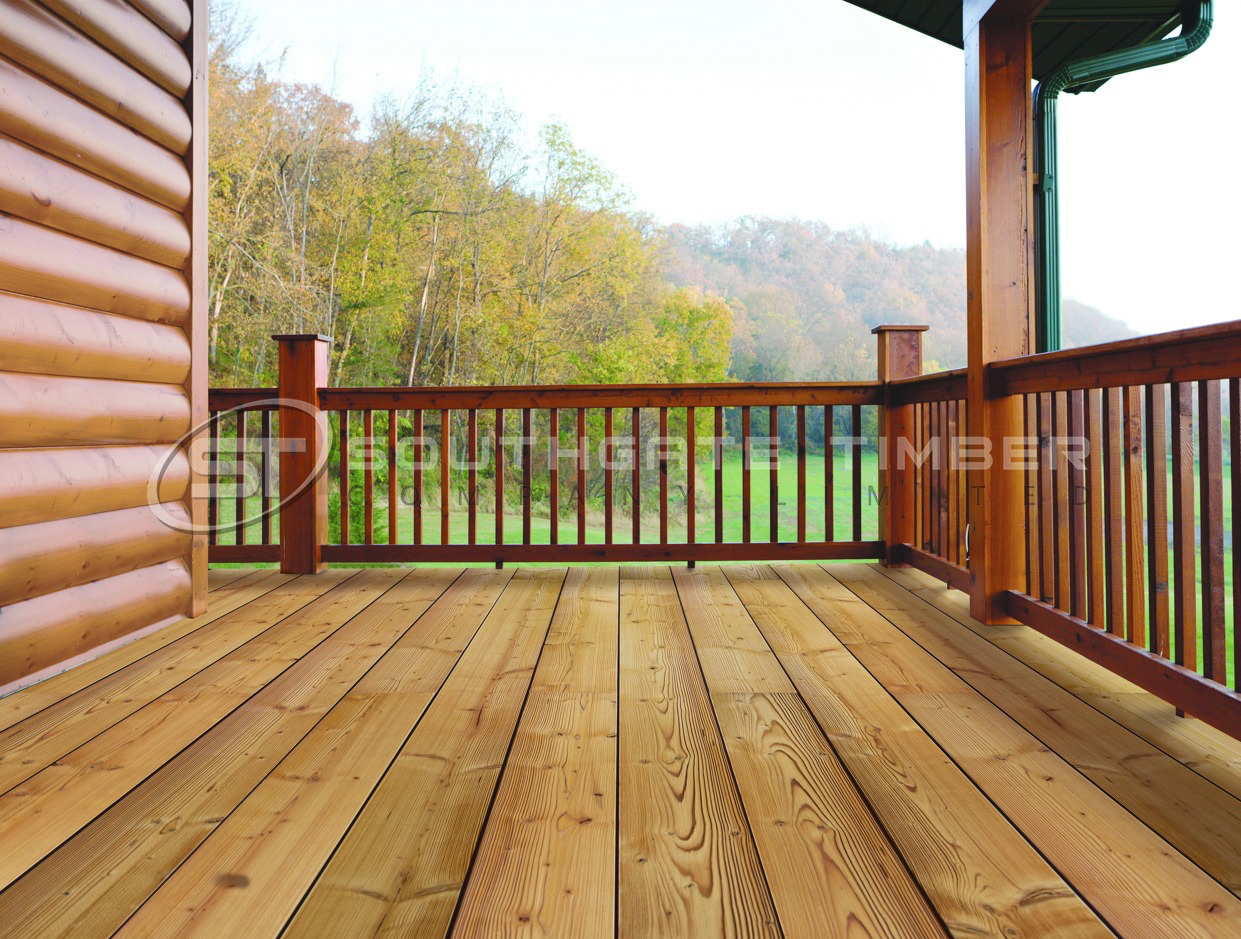 Thermory Spruce decking installed in a modern outdoor balcony and seating area
