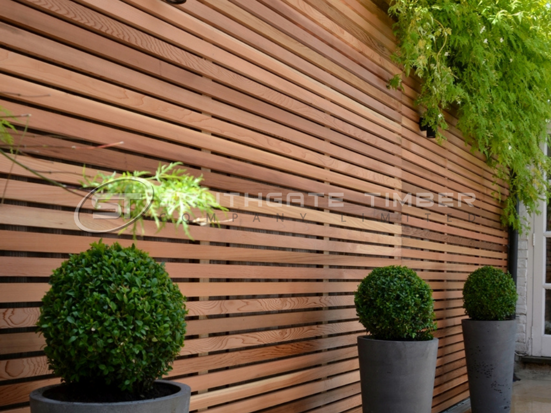 Western Red Cedar 20 x 45mm slatted garden fencing with natural warm red-brown tones