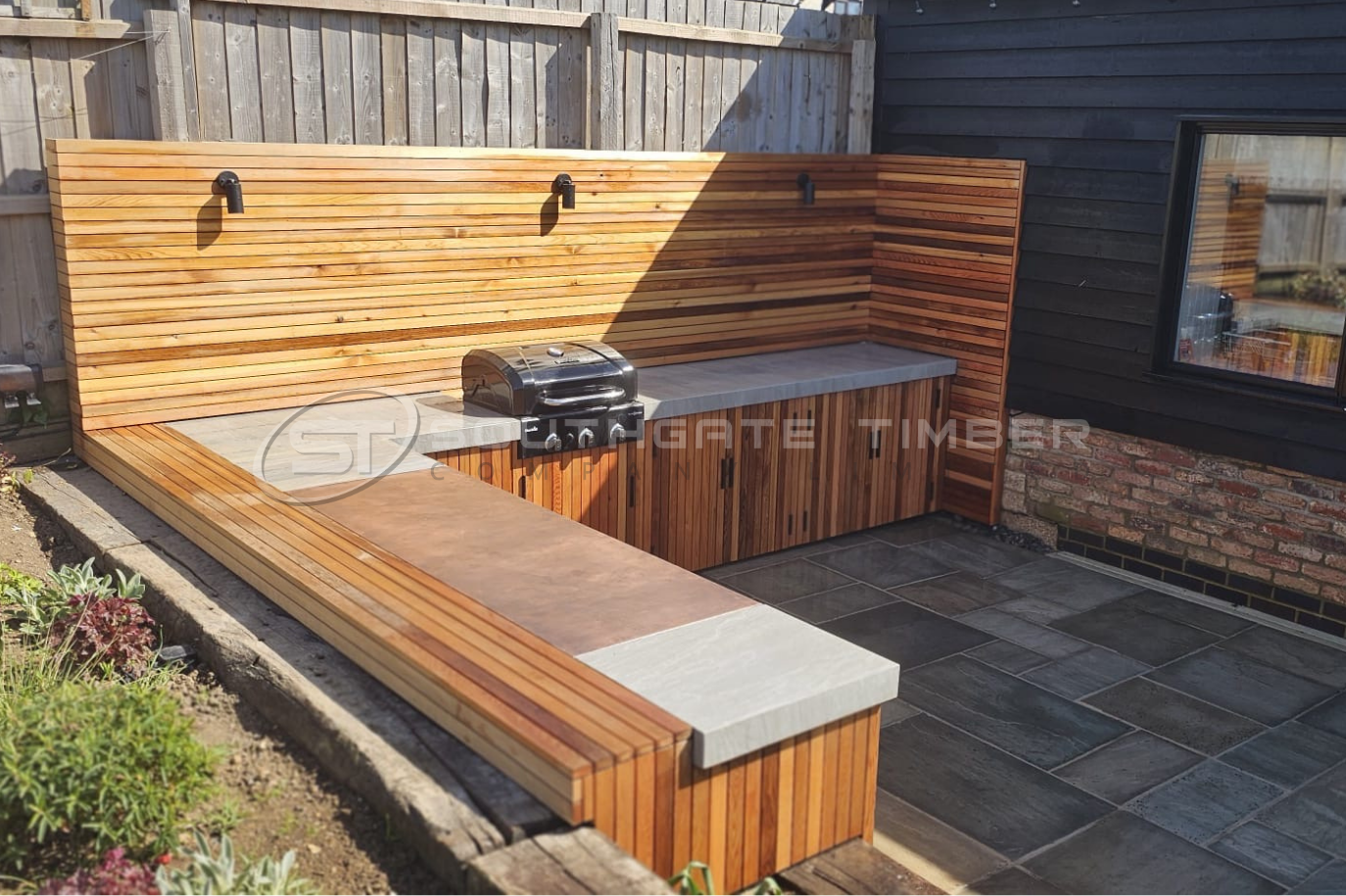 Western Red Cedar softwood screening and outdoor kitchen cladding showcasing the natural durability, stability and character of cedar timber.