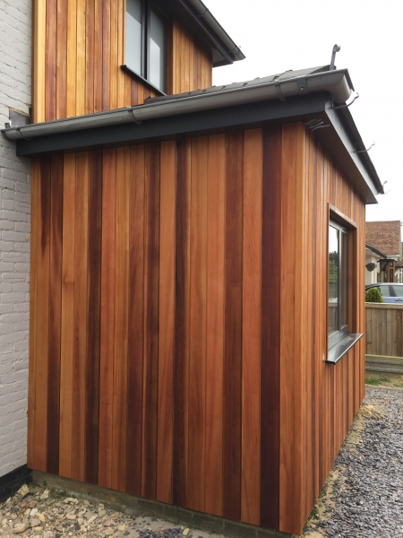 ST6 Cedar Cladding finished in Textrol HES